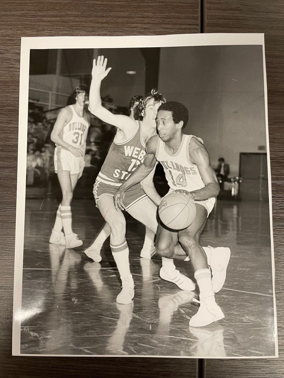 Dr. Scott Finnie, senior professor of Africana Studies at Eastern Washington University, brought this photo of him as a Gonzaga basketball player to the Carl Maxey Center on Oct. 14  (Garrett Cabeza / The Spokesman-Review)