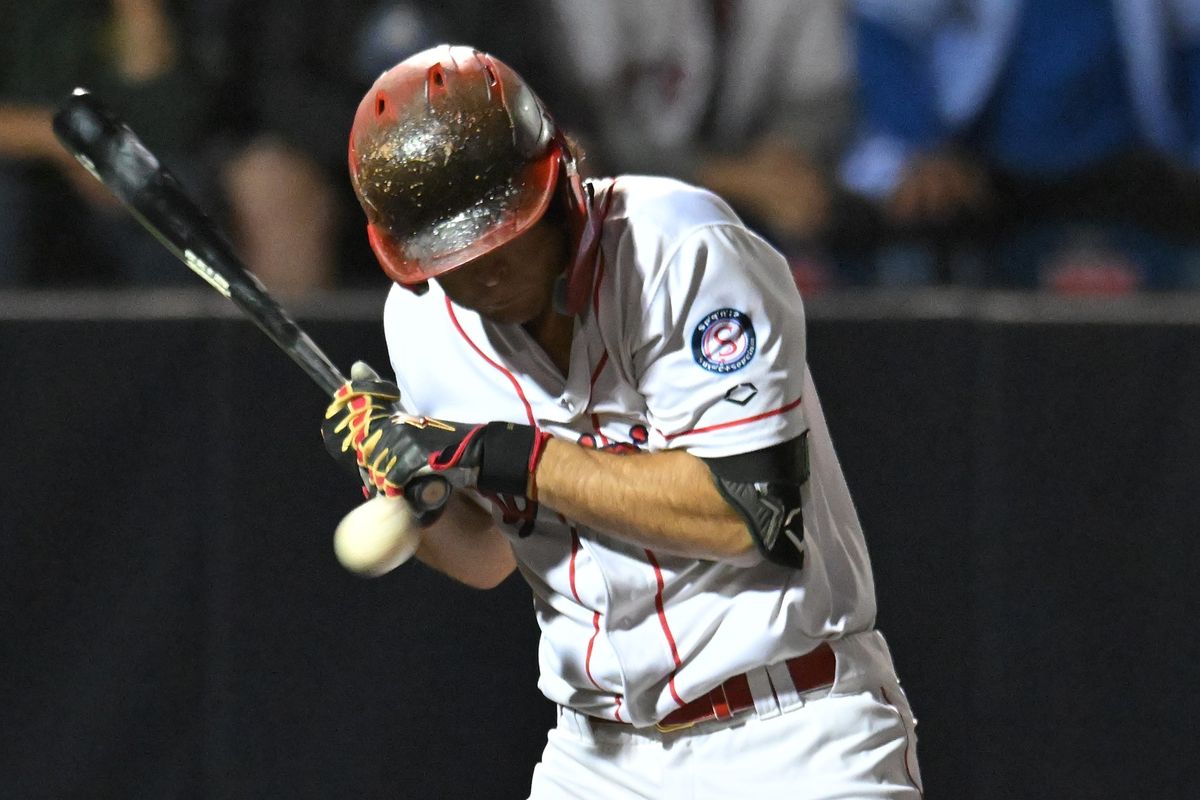 Spokane Indians third base Kyle Karros was hit by a pitch in the 10th inning to force in the winning run in the Northwest League championship series against the Vancouver Canadians on Sept 14, 2024.  (James Snook/Spokane Indians)