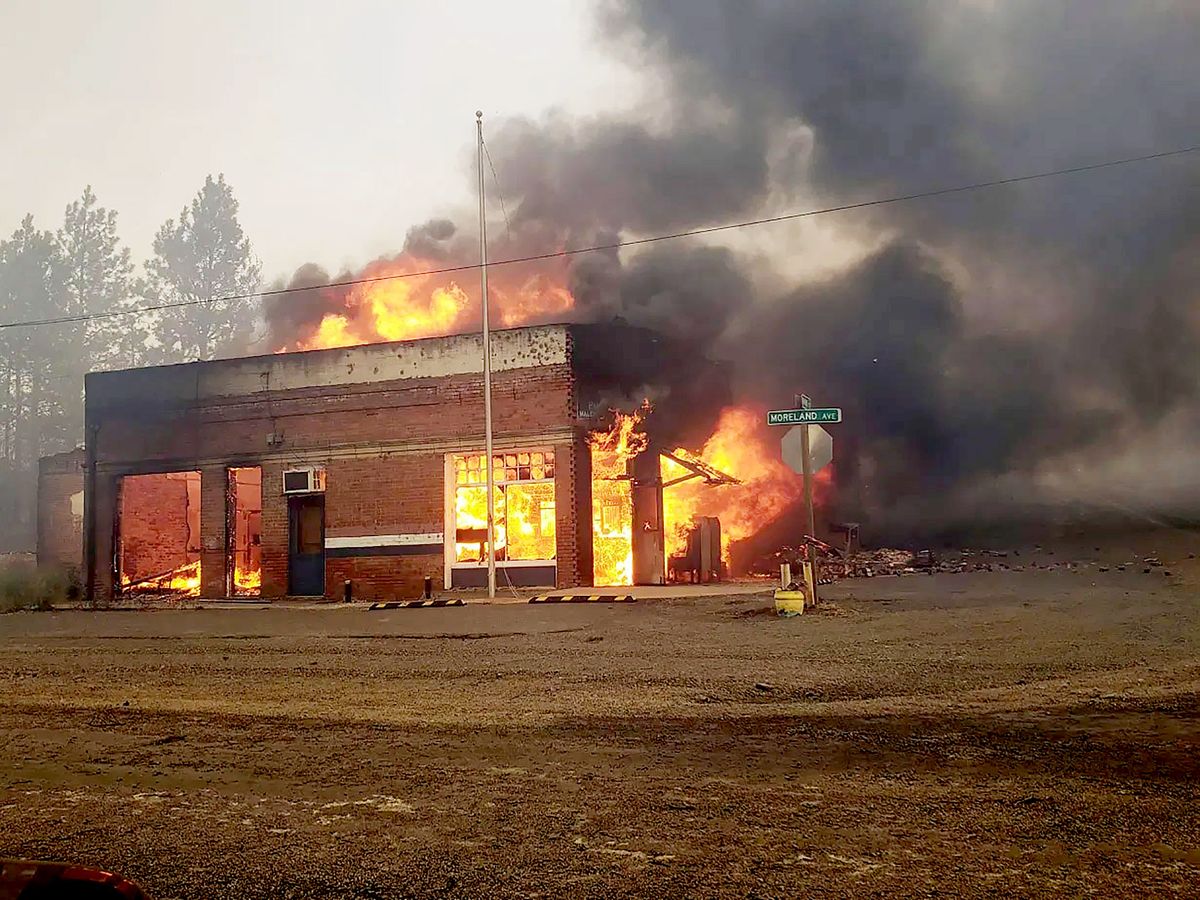 The post office in Malden was consumed by flames on Monday as a wildfire raced though the small farming community.