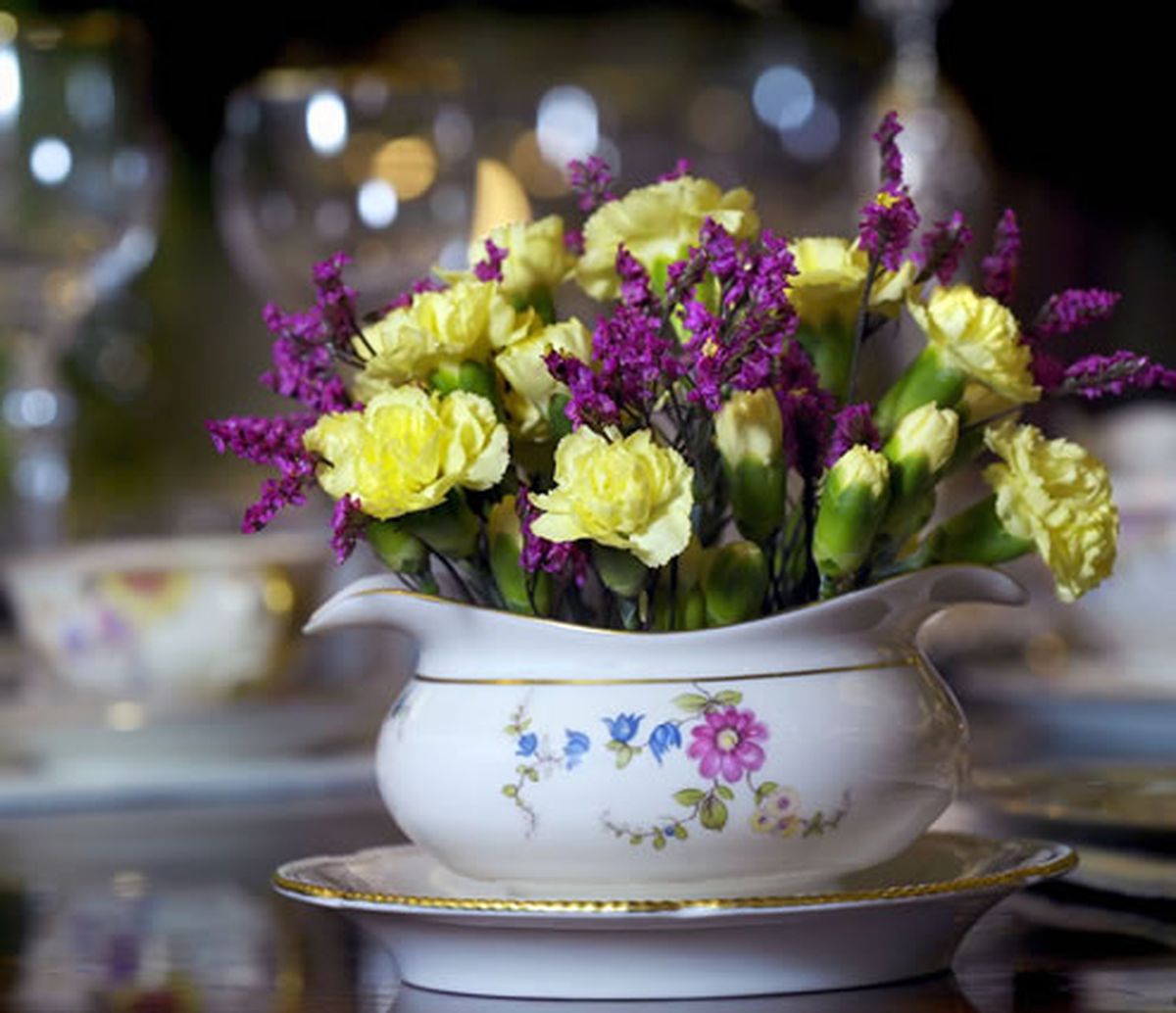 Serving pieces like this gravy boat can double as a vase. (ARA)