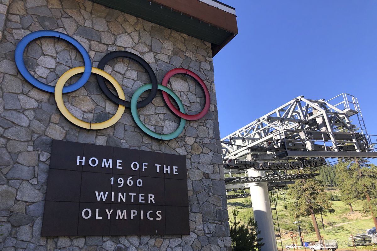 A sign marking the 1960 Winter Olympics is seen by a chairlift at Squaw Valley Ski Resort in Olympic Valley, Calif., July 9, 2020. California