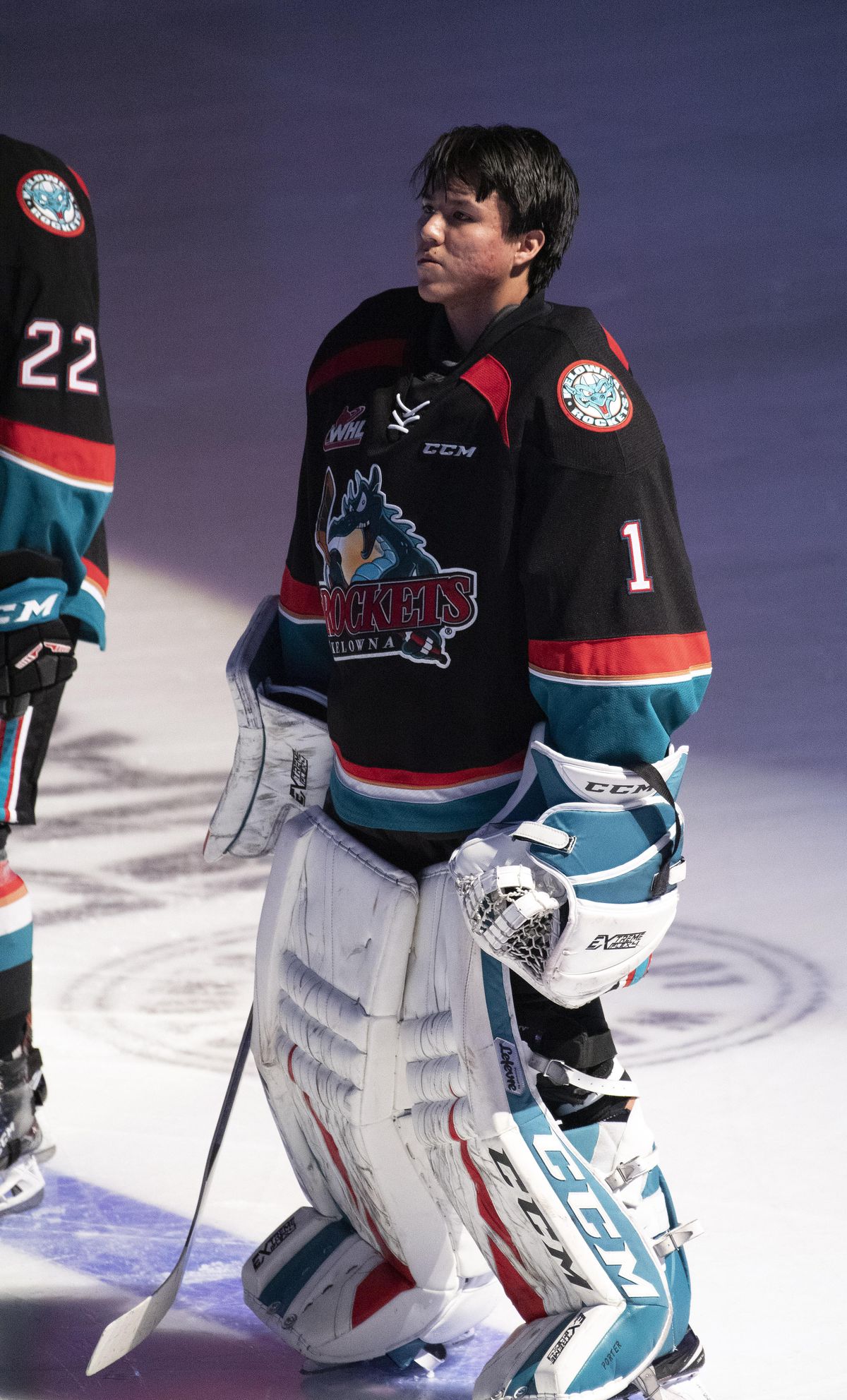 Kelowna goalie James Porter listens to the U.S. and Canadian national anthems before a Chiefs-Rockets hockey game on Feb. 1 at the Spokane Arena. (Colin Mulvany / The Spokesman-Review)