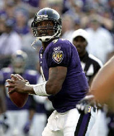 
 Ravens quarterback Steve McNair looks to pass to tight end Todd Heap in the fourth quarter.
 (Associated Press / The Spokesman-Review)