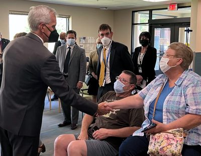 U.S. VA Secretary Denis McDonough, left, visits with local Air Force veteran Robert Henderson, center, and his wife and caregiver, Sandy Henderson. McDonough visited the Boise VA Medical Center and its staff on Thursday.  (Courtesy of the Department of Veterans Affairs)