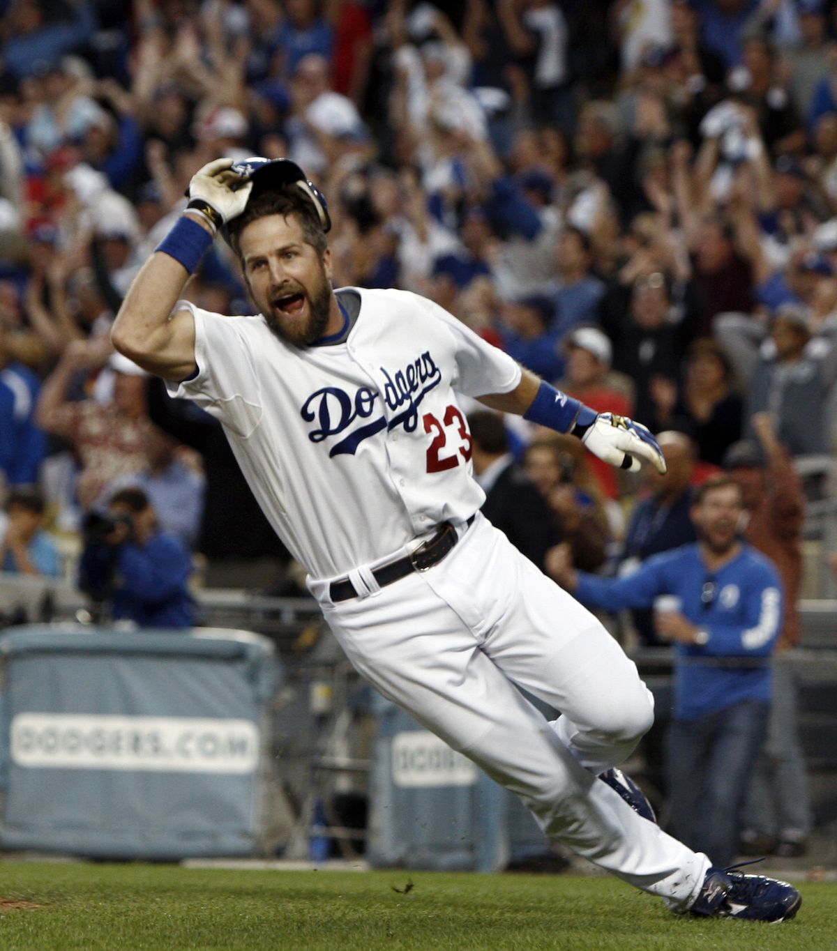 Casey Blake scores the winning run for the Los Angeles Dodgers in the bottom of the ninth inning.  (Associated Press / The Spokesman-Review)