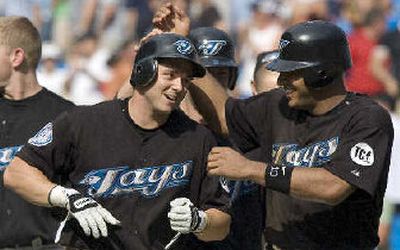 Toronto Blue Jays center fielder Vernon Wells makes a running