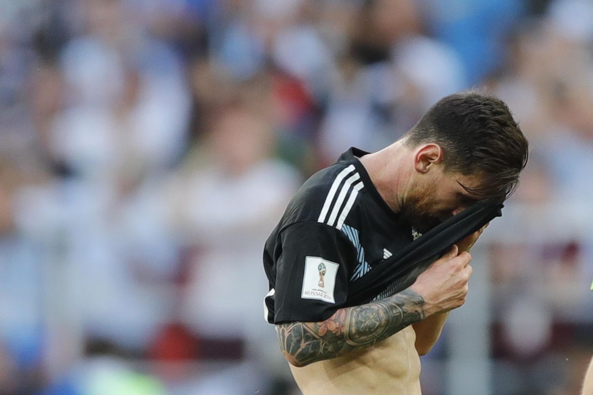 Argentina’s Lionel Messi covers his face at the end of the Group D match between Argentina and Iceland at the 2018 soccer World Cup in the Spartak Stadium in Moscow, Russia, Saturday, June 16, 2018. (Ricardo Mazalan / Associated Press)