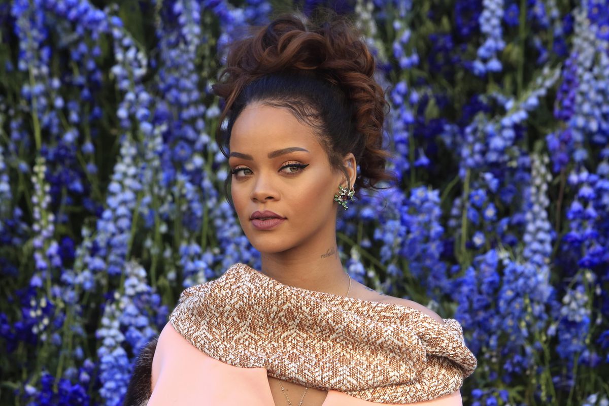 In this  Oct. 2, 2015, file photo, singer Rihanna poses before Christian Dior’s Spring-Summer 2016 ready-to-wear fashion collection. (Thibault Camus / Associated Press)