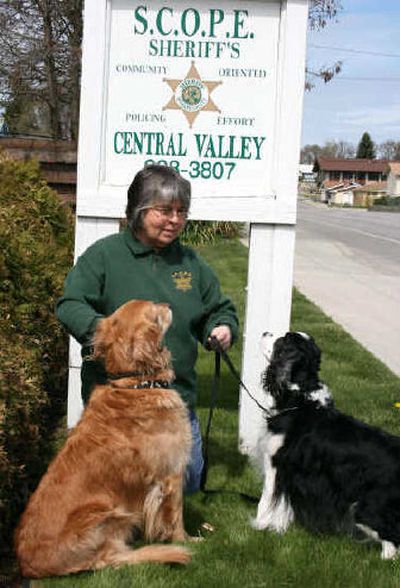 Deanna Hormann was nominated as a Good Neighbor for Spokane Valley. At Central Valley SCOPE, she stands with Goldie, her grandson's golden retriever, and Kitty, her Springer Spaniel, specially trained to work with Mountain West Search and Rescue.
(Steve Christilaw / The Spokesman-Review)