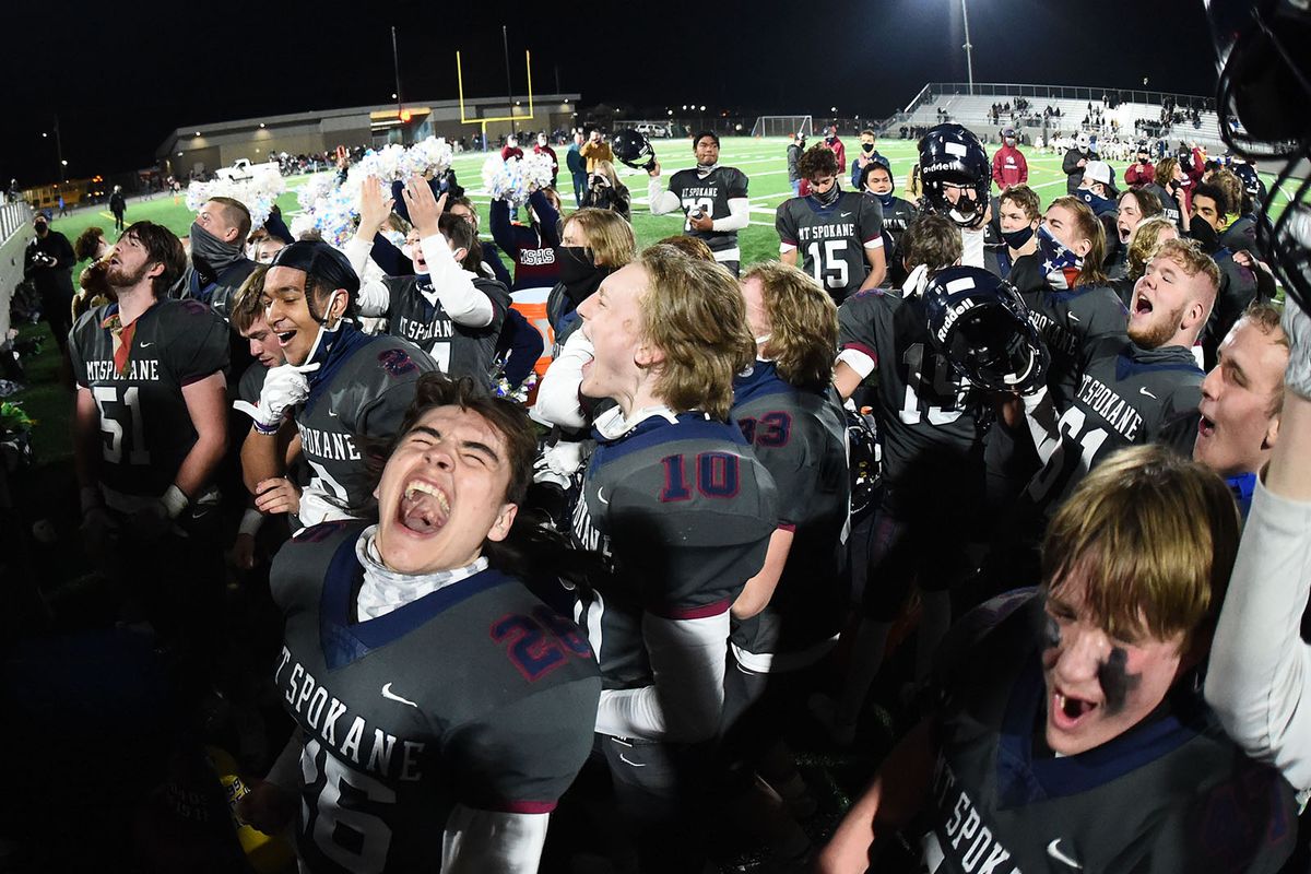 Mt. Spokane Wildcats celebrate after the Battle of the Bell on Fri. April 2, 2021 at Union Stadium in Spokane WA.  (James Snook For The Spokesman-Review)
