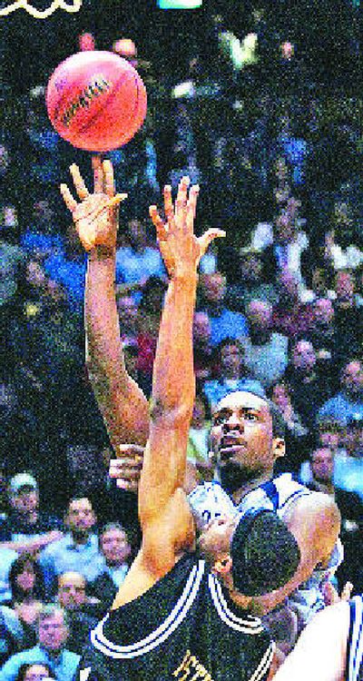 
Green takes his game-winning shot over Vanderbilt's Shan Foster in the East Regional semifinal. 
 (Associated Press / The Spokesman-Review)