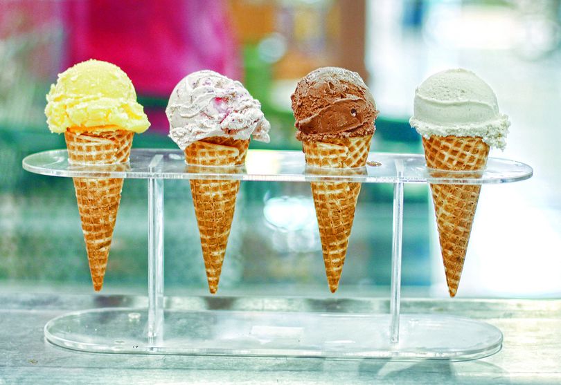 Pilgrim’s Market in Coeur d’Alene is now making ice cream at the store in time for hot summer weather. Owner Joe Hamilton worked with the owner of Bi-Rite Creamery in San Francisco to develop the new offerings, which include (from left) mango sorbet, strawberry balsamic, melted chocolate chip and dairy-free coconut vanilla.