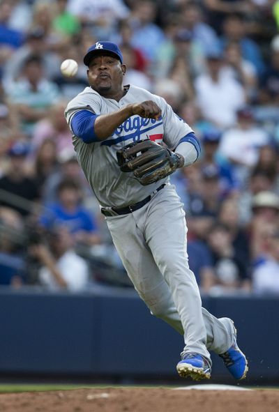 Dodgers third baseman Juan Uribe has proven himself a leader both on and off the field. (Associated Press)