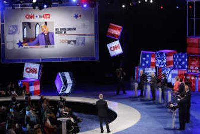 
Democratic presidential hopefuls listen to a question from the Rev. Reggie Longcrier, of Hickory, N.C., during  Monday's debate. Associated Press
 (Associated Press / The Spokesman-Review)