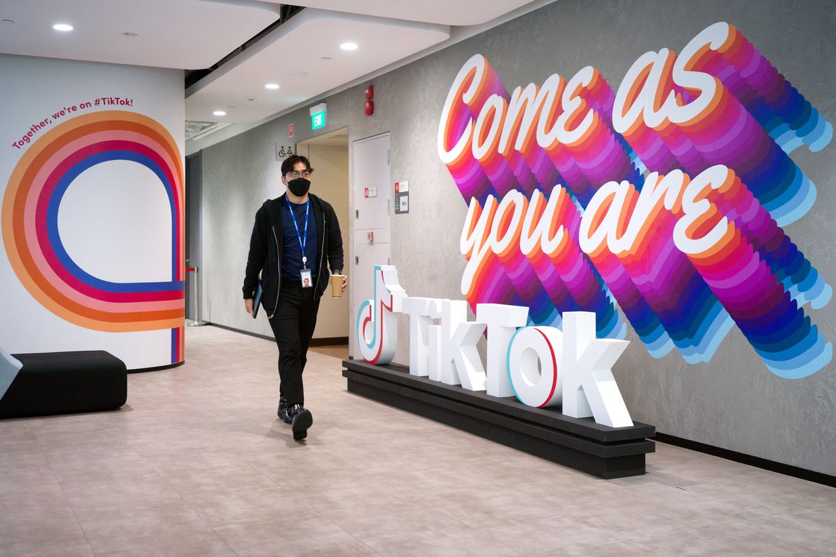 A person walks through the offices of ByteDance, the Chinese owner of TikTok, in Shanghai. TikTok is at the center of a geopolitical and economic battle between the United States and China over tech leadership and national security. (New York Times)