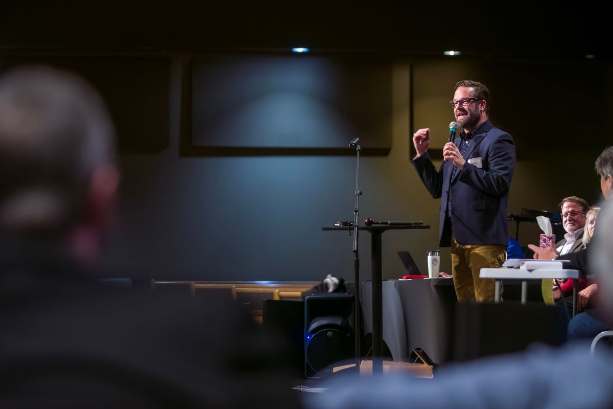 Brian Noble, the new chair of the Spokane County Republican Party, speaks to a crowd of precinct committee officers Dec. 10 at Valley Assembly of God church.   (Colin Tiernan/The Spokesman-Review)