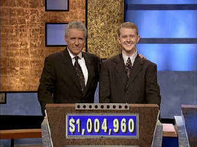 
Software developer Ken Jennings, right, from Salt Lake City, poses for a photo with 