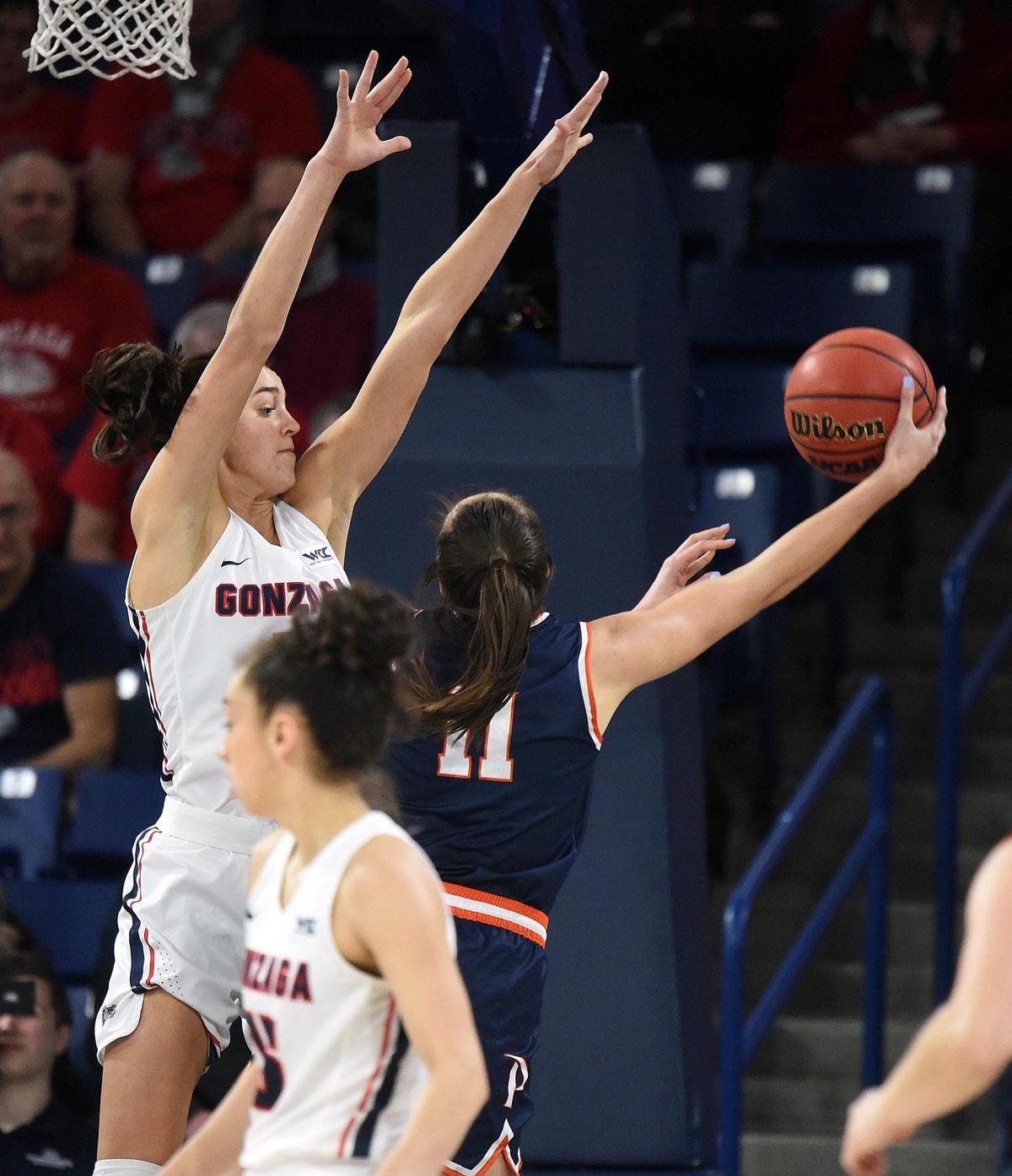 Gonzaga forward Jenn Wirth (3) tries to stop a shot by Pepperdine Waves forward Monique Andriuolo (11) during the first half of a college basketball game, Thurs., Jan. 23, 2020, at the McCarthey Athletic Center. (Colin Mulvany / The Spokesman-Review)
