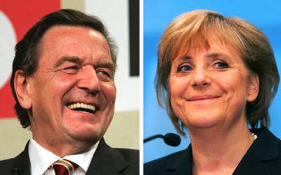 
Schroeder, left, and Merkel
 (The Spokesman-Review)