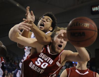 Gonzaga’s Elias Harris and South Dakota’s Trevor Gruis battle for control of a rebound in the first half of the nonconference game played Nov. 18, 2012 in the McCarthey Athletic Center. Gonzaga won 96-58. The two teams meet again on Wednesday at McCarthey. (Colin Mulvany / The Spokesman-Review)