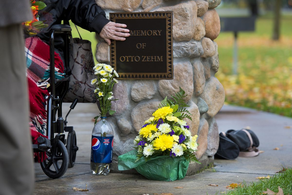 Ann Zehm pauses to reflect on her son’s memorial after a plaque dedication ceremony Wednesday in Mission Park. (Dan Pelle)