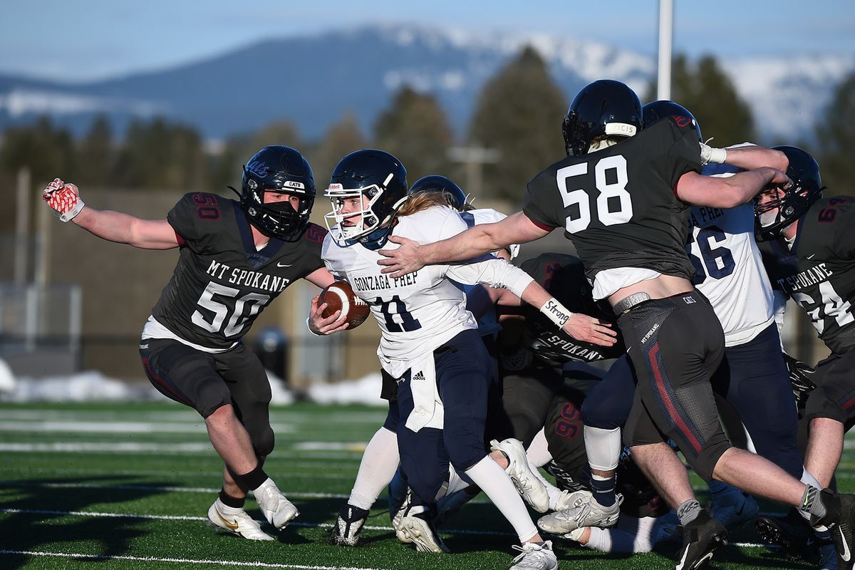 Gonzaga Prep quarterback Ryan McKenna carries against Mt. Spokane at Union Stadium on Feb. 27. G-Prep held on to win 10-7.  ( James Snook/For The Spokesman-Review)