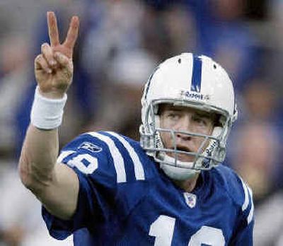 
Indianapolis quarterback Peyton Manning is one of three players to win MVP in consecutive seasons.
 (Associated Press / The Spokesman-Review)