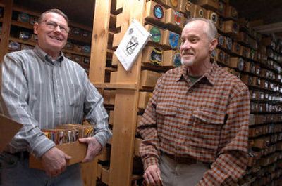 
Don McGrogan, left, and his stepson, Randy Sweet, reproduce and sell military patches to collectors, military buffs, vets and even Hollywood. 
 (Jesse Tinsley / The Spokesman-Review)
