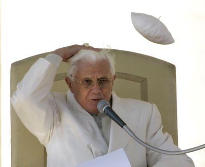 Pope Benedict XVI reacts as he loses his skullcap to a gust of wind during the weekly general audience in St. Peter’s Square at the Vatican Wednesday.  (Associated Press / The Spokesman-Review)