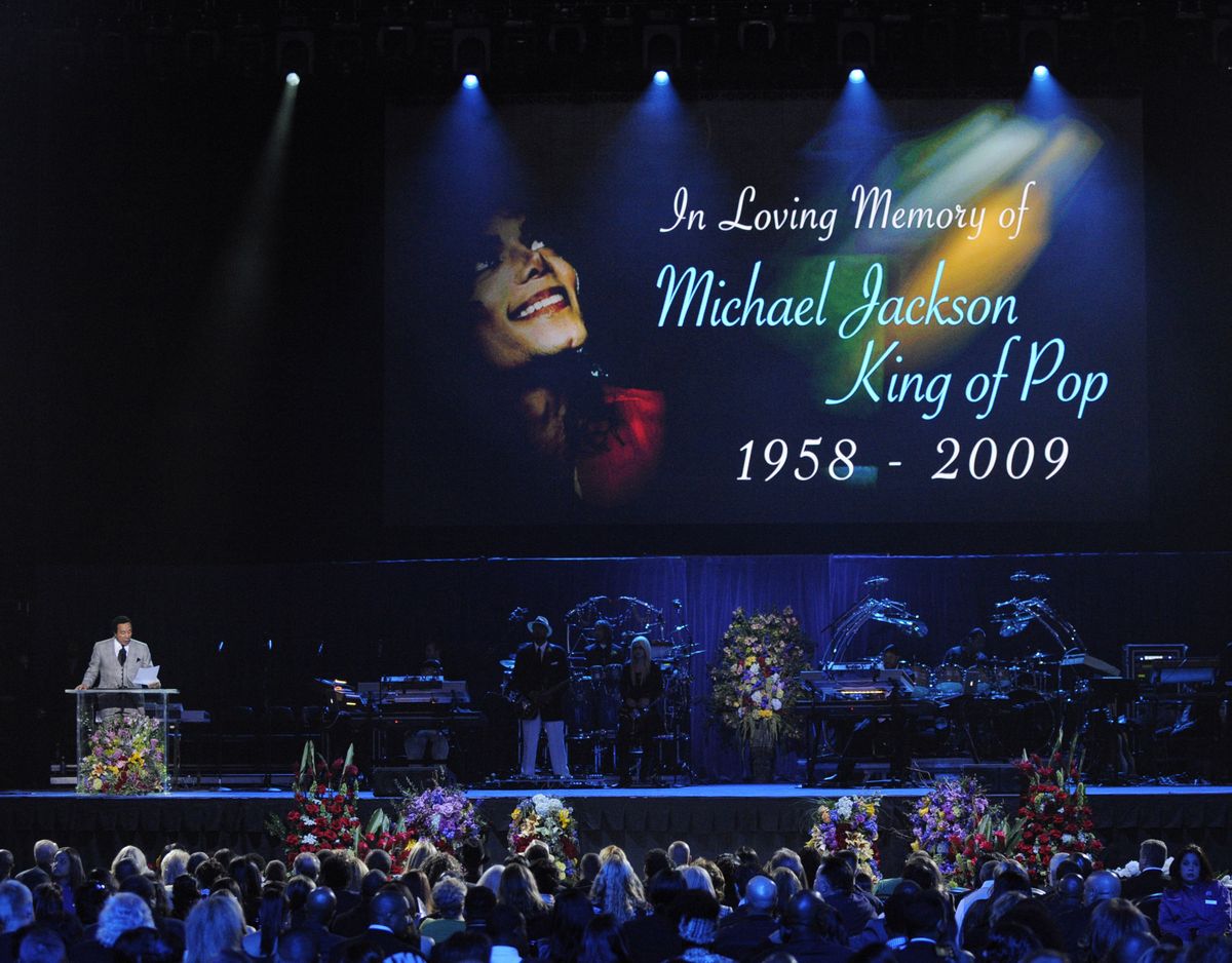  Musician Smokey Robinson speaks during the memorial service for Michael Jackson at the Staples Center in Los Angeles, Tuesday, July 7, 2009.  (Mark Terrill / Associated Press)