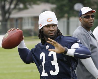 Chicago Bears return specialist Devin Hester has ended his holdout and worked out with the team on Friday.  (Associated Press / The Spokesman-Review)