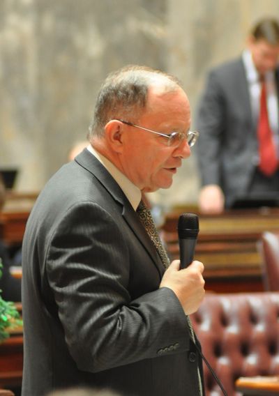 OLYMPIA -- Sen Mike Padden makes his first formal remarks on the Senate floor, just before colleagues kid him about returning to the Legislature after being away for 16 years. (Jim Camden)