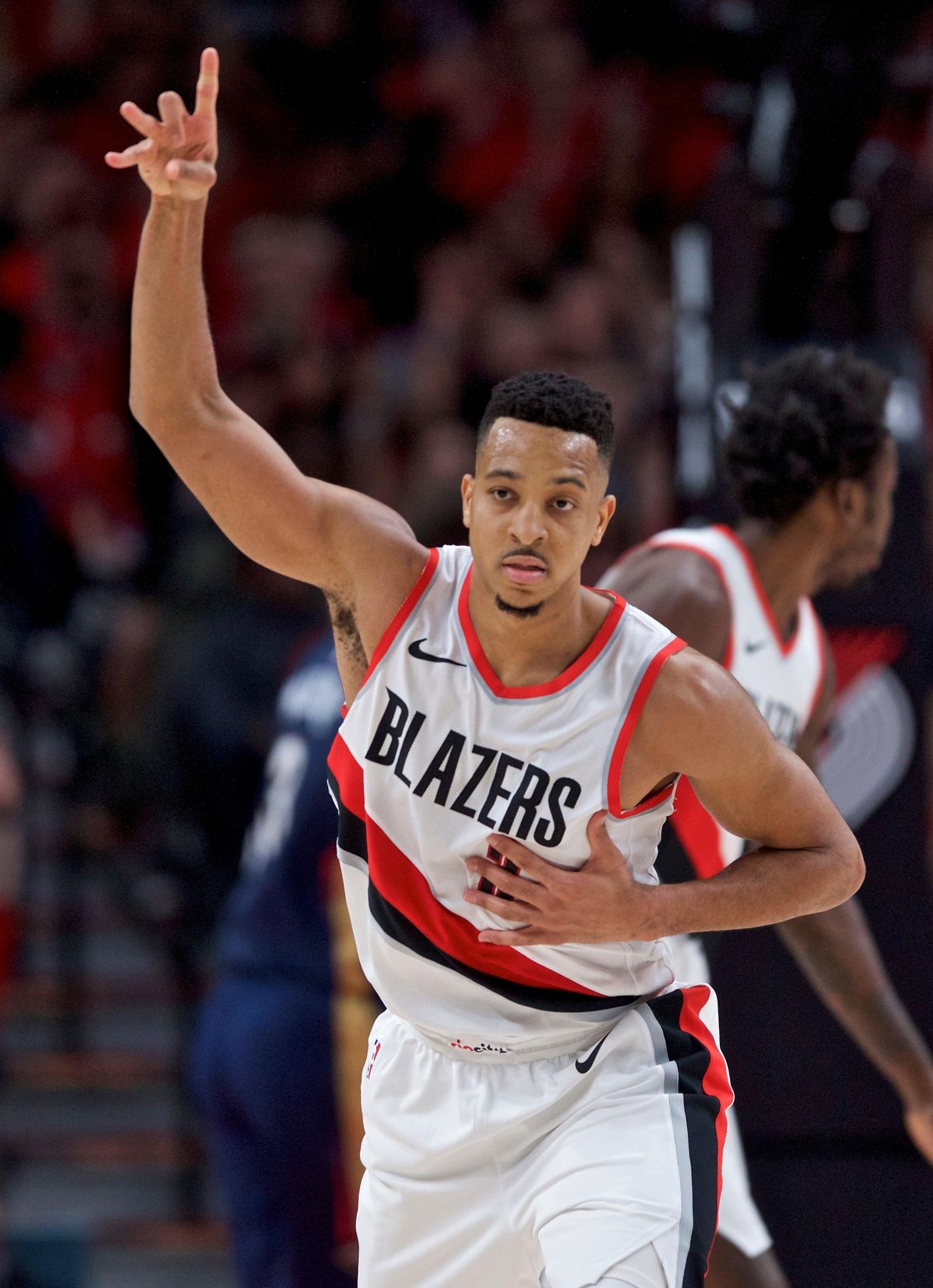 Portland Trail Blazers guard CJ McCollum gestures after hitting a 3-point basket against the New Orleans Pelicans during the first half of Game 2 of an NBA basketball first-round playoff series Tuesday, April 17, 2018, in Portland, Ore. (Craig Mitchelldyer / Associated Press)