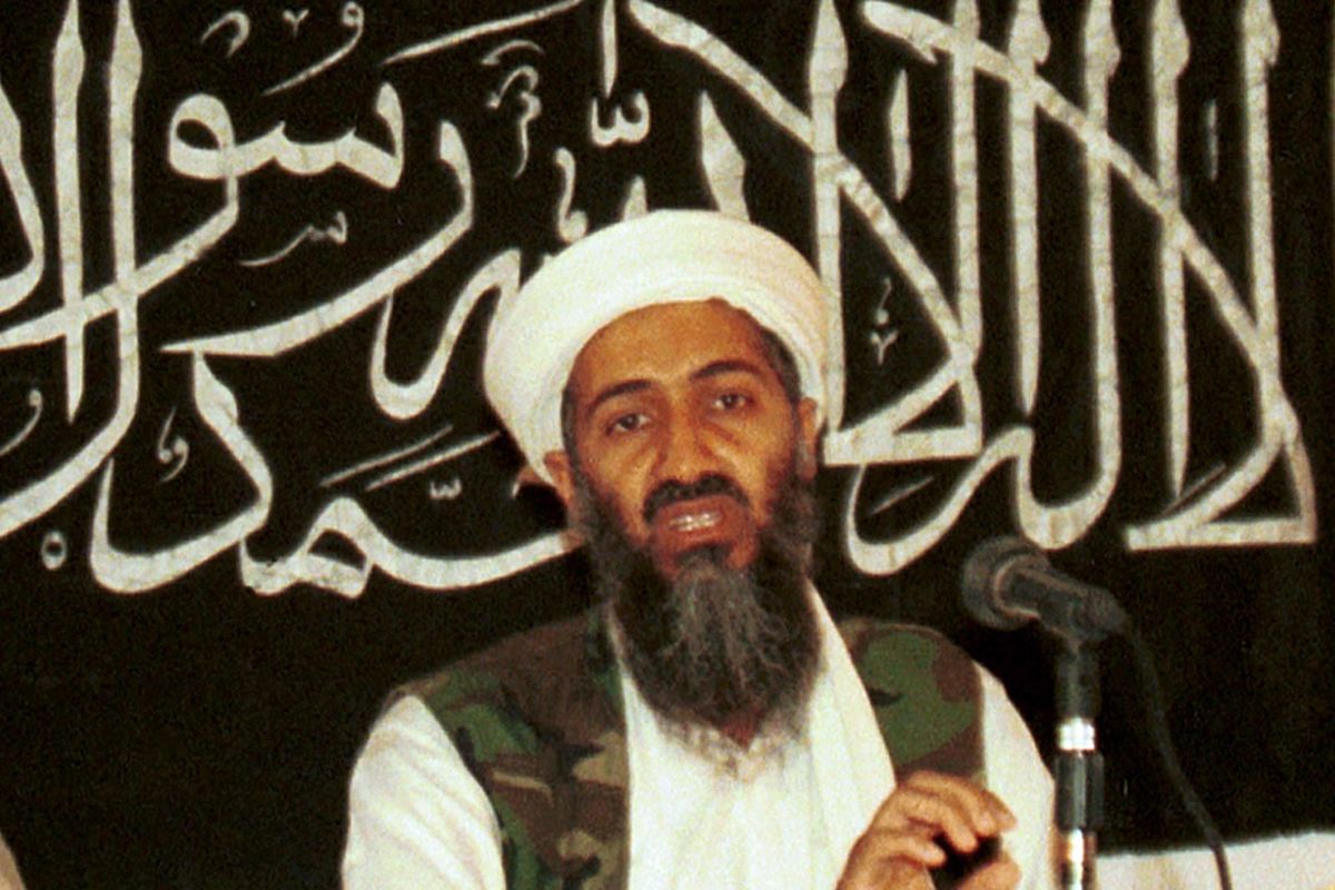 In this 1998 file photo made available on March 19, 2004, Osama bin Laden is seen at a news conference in Khost, Afghanistan. Bin Laden was on the FBI’s Ten Most Wanted Fugitives list before the terrorist attacks of 9/11, put there for his role in the 1998 deadly bombings of U.S. embassies in Tanzania and Kenya, appearing as Usama bin Laden. (Mazhar Ali Khan / Associated Press)