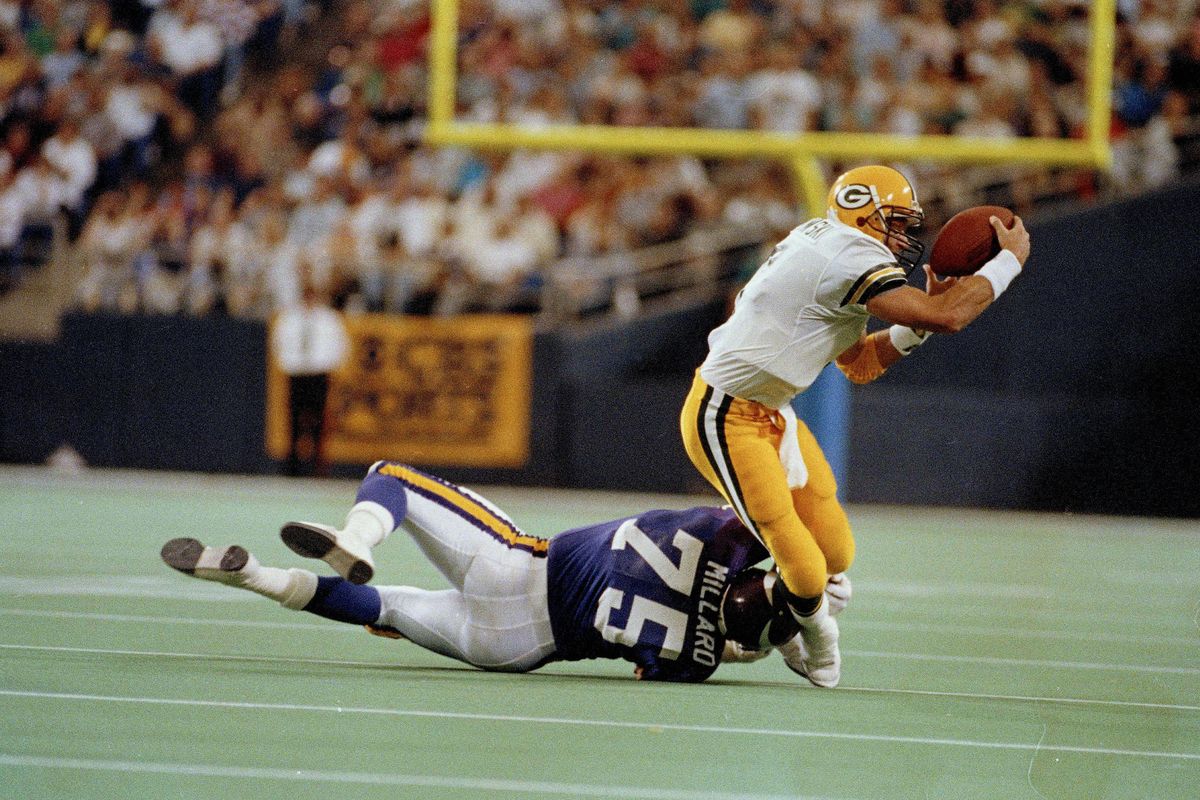 Green Bay Packers quarterback Don Majkowski gets taken down by Minnesota Vikings tackle Keith Millard for his 8th sack of the game in Minneapolis, Oct. 15, 1989. (Jim Mone / AP)