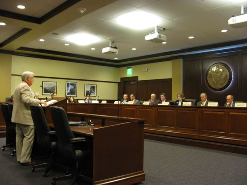 Rep. Dick Harwood, R-St. Maries, urges the House State Affairs Committee on Thursday to pass his bill to declare guns or ammunition manufactured in Idaho exempt from federal laws including registration. Harwood said his bill is designed to prompt a court case; the committee voted to send it to the full House. (Betsy Russell)