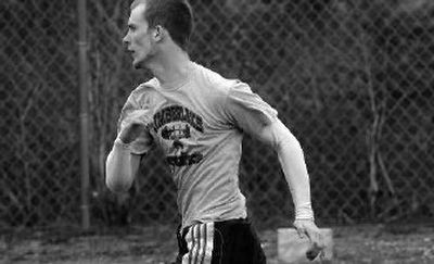 
Timberlake High School senior John Macklin runs during track practice at the school in Spirit Lake. 
 (Kathy Plonka / The Spokesman-Review)