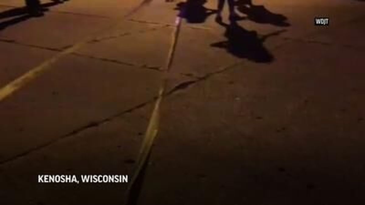 Officers deployed tear gas early Monday to disperse hundreds of people who protested after a police shooting in Kenosha, Wisconsin that also drew a harsh rebuke from the governor. 
