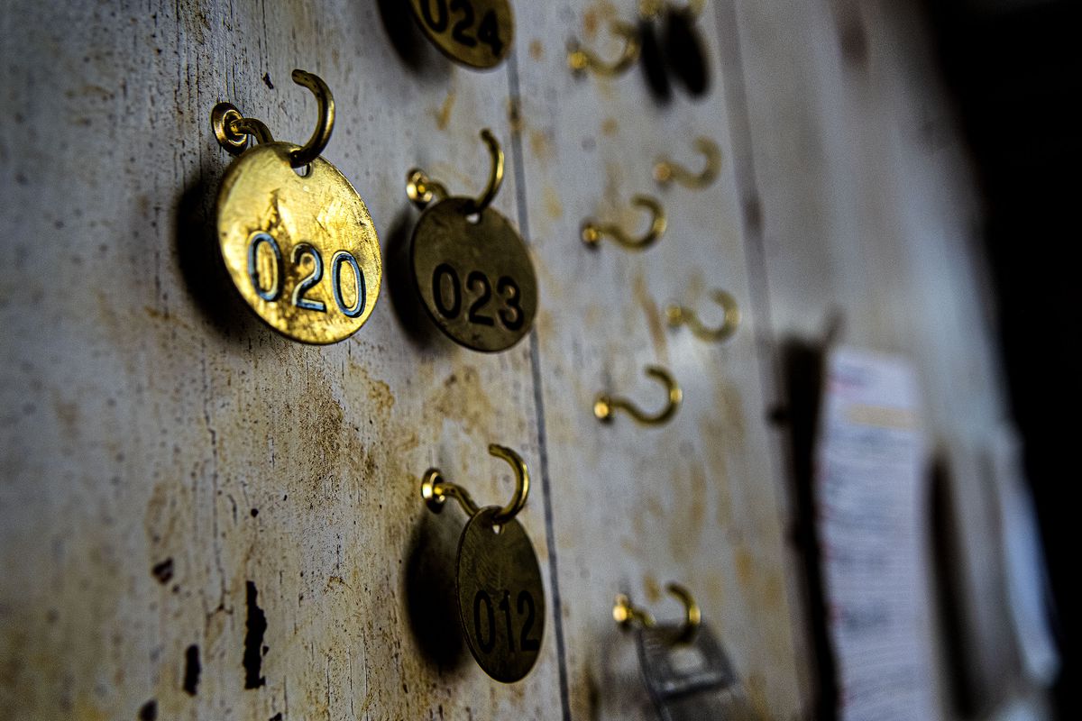 The miners brass badges are worn by everyone who enters Bunker Hill Mine in Wardner, Idaho on Tuesday, March 30, 2021. New investors are using a more environmentally friendly method as they reopen the mine.  (Kathy Plonka/The Spokesman-Review)