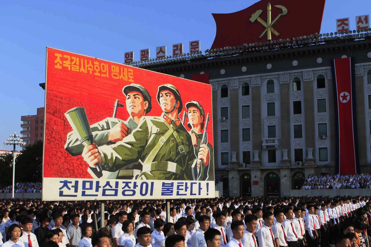 Tens of thousands of North Koreans gathered for a rally at Kim Il Sung Square carrying placards and propaganda slogans as a show of support for their rejection of the United Nations