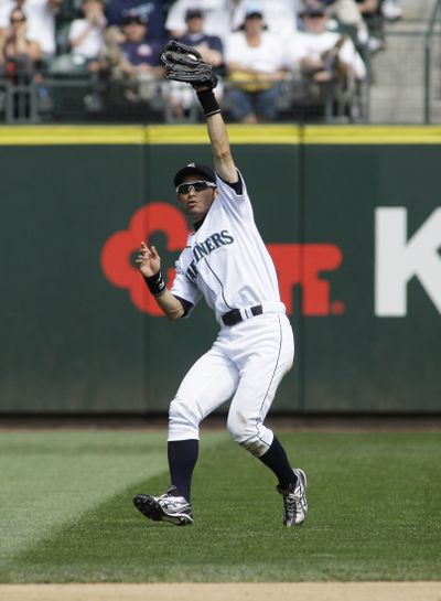 Seattle  outfielder Ichiro Suzuki won his ninth career Gold Glove.  (Associated Press / The Spokesman-Review)