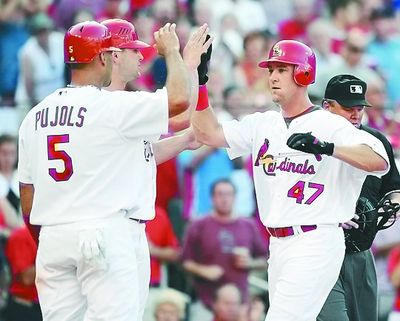  Ryan Ludwick’s (47) three-run home run in the first got the Cardinals started against the M’s. (Associated Press)