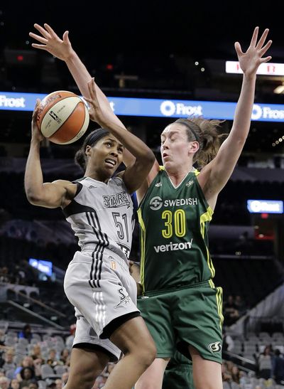 Seattle Storm forward Breanna Stewart, right, defends San Antonio Stars guard Sydney Colson during the first half of Tuesday’s game in San Antonio. (Eric Gay / Associated Press)