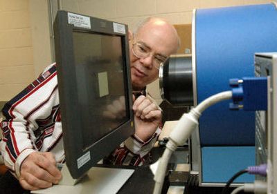 Larry Leise checks an LCD screen on the IBM campus in Research Triangle Park, N.C. Leise is among the first batch of IBM employees taking the company up on its offer to pay for college classes needed to become a math or science teacher.
(Associated Press / The Spokesman-Review)