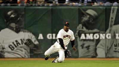 Barry Bonds enjoying his new job as he returns to San Francisco