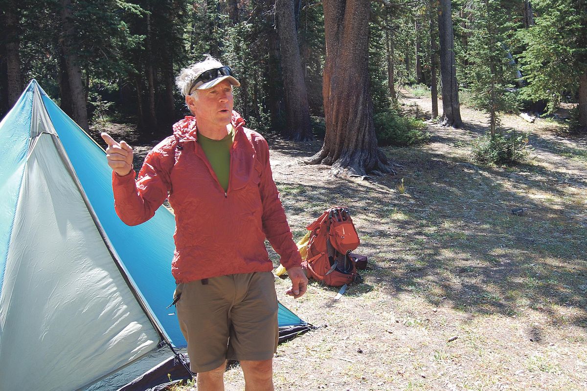 Ed Cannady, the U.S. Forest Services Boulder-White Clouds backcountry recreation manager, discusses his favorite parts of the wilderness after setting up his tent last month. (Luke Ramseth lramseth@postregister.com)