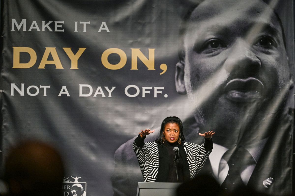 NAACP President Lisa Gardner address the crowd at the MLK Rally and march in the Spokane Convention Center on Monday.  (DAN PELLE/THE SPOKESMAN-REVIEW)