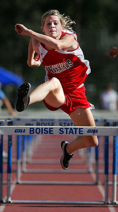 
Kootenai senior Darcy Collins takes the final high hurdle on the way to winning three events. 
 (Matt Cilley Special to / The Spokesman-Review)