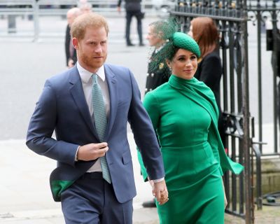 Prince Harry, Duke of Sussex, and Meghan, Duchess of Sussex, meet children as she attends the Commonwealth Day Service 2020 on March 9, 2020, in London.  (Tribune News Service)