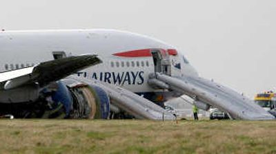 
A British Airways Boeing 777 plane flying in from China landed short of the runway at London's Heathrow Airport on Thursday. 
 (Associated Press / The Spokesman-Review)